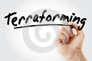 Hand writing Terraforming with marker