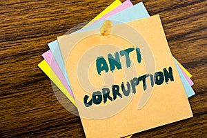 Hand writing text caption inspiration showing Anti Corruption. Business concept for Bribery Corrupt Text written on sticky note pa