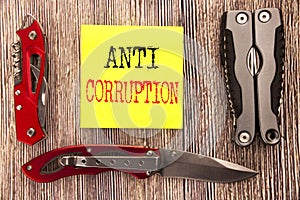 Hand writing text caption inspiration showing Anti Corruption. Business concept for Bribery Corrupt Text Written on sticky note wo