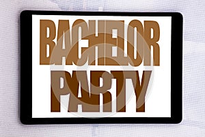 Hand writing text caption inspiration showing Bachelor Party. Business concept for Stag Fun Celebrate written on tablet screen on