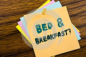 Hand writing text caption inspiration showing Bed Breakfast. Business concept for Holiday Journey Travel written on sticky note p