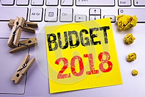 Hand writing text caption inspiration showing Budget 2018. Business concept for Household budgeting accounting planning written on