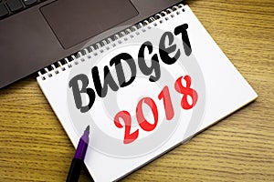 Hand writing text caption inspiration showing Budget 2018. Business concept for Household budgeting accounting planning written on