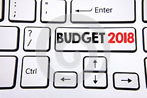 Hand writing text caption inspiration showing Budget 2018. Business concept for Household budgeting accounting planning written on