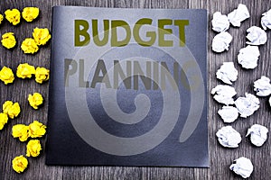 Hand writing text caption inspiration showing Budget Planning. Business concept for Financial Budgeting Written on notepad note no