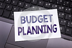 Hand writing text caption inspiration showing Budget Planning. Business concept for Financial Budgeting written on sticky note pap