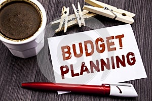 Hand writing text caption inspiration showing Budget Planning. Business concept for Financial Budgeting written on sticky note pap