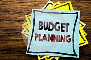 Hand writing text caption inspiration showing Budget Planning. Business concept for Financial Budgeting written on sticky note pap