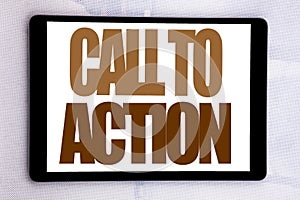 Hand writing text caption inspiration showing Call To Action. Business concept for Proactive Success Goal written on tablet screen