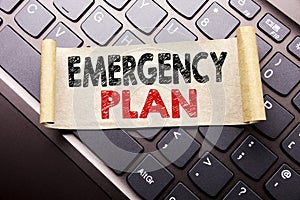 Hand writing text caption inspiration showing Emergency Plan. Business concept for Disaster Protection written on sticky note pape