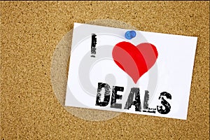 Hand writing text caption inspiration showing I Love Deals concept meaning Advertising Deal Loving written on sticky note, reminde