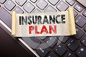 Hand writing text caption inspiration showing Insurance Plan. Business concept for Health Life Insured written on sticky note pape