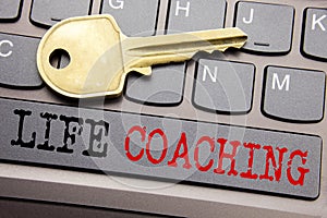 Hand writing text caption inspiration showing Life Coaching. Business concept for Personal Coach Help written on keyboard key on t