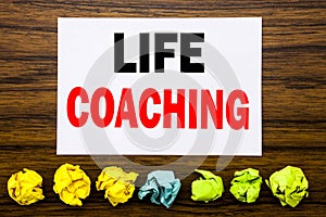 Hand writing text caption inspiration showing Life Coaching. Concept for Personal Coach Help Written on sticky note , with sticky,