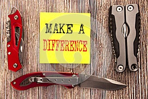 Hand writing text caption inspiration showing Make A Difference. Business concept for Motivation Success Written on sticky note wo