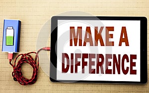 Hand writing text caption inspiration showing Make A Difference. Business concept for Motivation Success written on tablet laptop