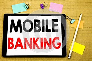 Hand writing text caption inspiration showing Mobile Banking. Business concept for Internet Banking e-bank Written on tablet lapto