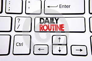 Hand writing text caption inspiration showing Daily Routine. Business concept for Habitual Lifestyle written on white keyboard key