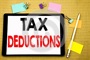 Hand writing text caption inspiration showing Tax Deductions. Business concept for Finance Incoming Tax Money Deduction Written on