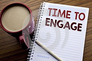 Hand writing text caption inspiration showing Time To Engage. Business concept for Engagement Involvement written on note paper no photo