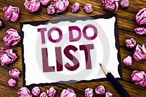 Hand writing text caption inspiration showing To Do List. Business concept for Plan Lists Remider Written on sticky note paper, wo