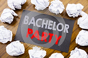 Hand writing text caption showing Bachelor Party. Business concept for Stag Fun Celebrate written on sticky note paper on the wood