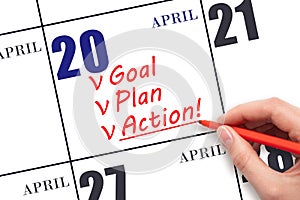 Hand writing text GOAL PLAN ACTION on calendar date April 20. Motivation for a new day. Business concept.