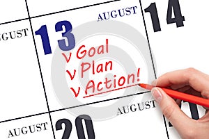 Hand writing text GOAL PLAN ACTION on calendar date August 13. Motivation for a new day. Business concept.