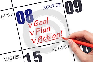 Hand writing text GOAL PLAN ACTION on calendar date August 8. Motivation for a new day. Business concept.