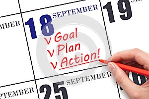 Hand writing text GOAL PLAN ACTION on calendar date September 18. Motivation for a new day. Business concept.