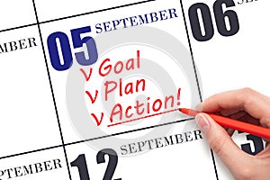 Hand writing text GOAL PLAN ACTION on calendar date September 5. Motivation for a new day. Business concept.