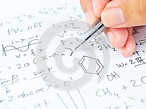 Hand writing various high school maths and science