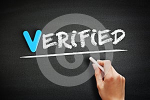 Hand writing Verified on blackboard, concept background