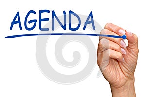 Hand writing word agenda