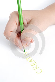 Hand writing word with green pencil