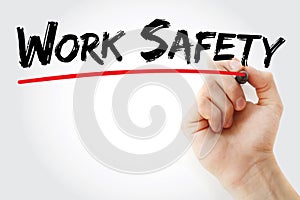 Hand writing Work Safety with marker, health concept background