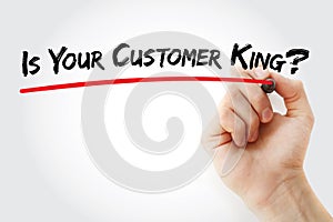 Hand writing Is Your Customer King? with marker, concept background