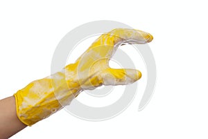 Hand in a yellow rubber glove