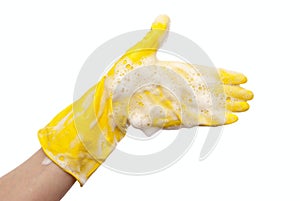 Hand in yellow rubber glove