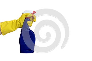 Hand in yellow rubber glove holding a blue cleaning spray bottle close up isolated on white with copy space. Washing, cleaning and