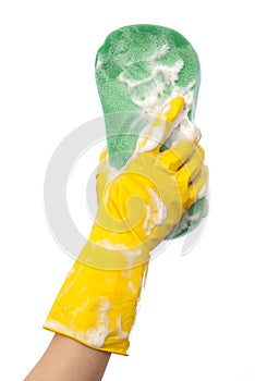 Hand in yellow rubber glove soap