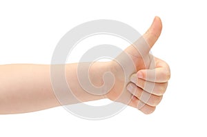 Hand of young kid shows thumb up.