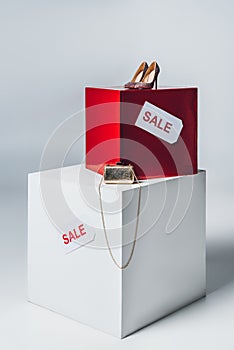 handbag, high heels and sale signs, summer