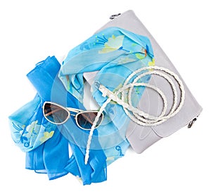 Handbag, light silk scarf, skinny braided belt and sunglasses