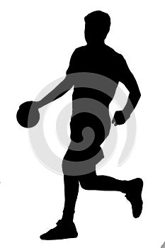 Handball player as silhouette isolated while shooting a throwing a ball