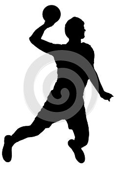 Handball player as silhouette isolated while shooting a throwing a ball