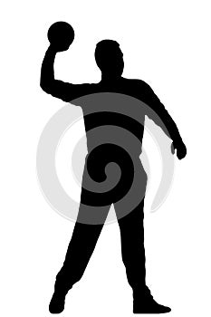 Handball player as silhouette isolated while throwing a ball