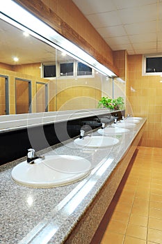 Handbasin and mirror in toilet