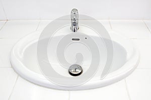 Handbasin in toilet photo
