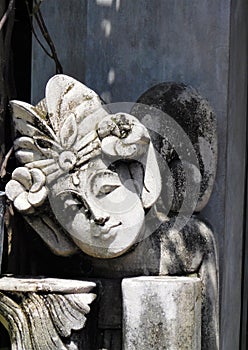 Handcarved statue of a man dressed for a temple visit in Bali